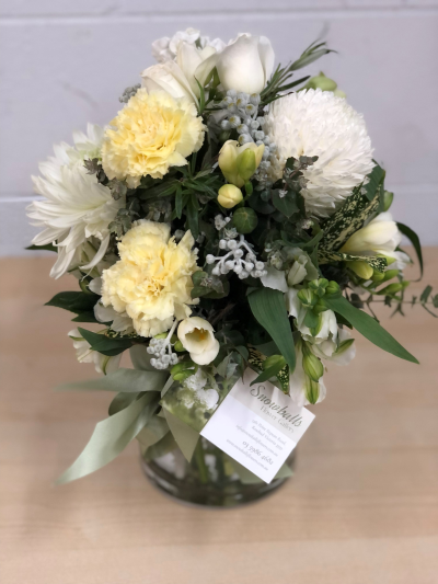 Little Moments - This petite vase of blooms is designed as a sweet, thoughtful gesture—ideal for a bedside table, desk, or any space with limited room. It’s a simple and heartfelt way to say, “I’m here.”

Each arrangement is a florist‑choice design, meaning the flowers are carefully selected to suit the occasion, using the freshest seasonal blooms available on the day. The result is a charming, compact arrangement that brings a touch of beauty without overwhelming a small space.

Perfect for get‑well wishes, thinking‑of‑you moments, or a gentle surprise just because.